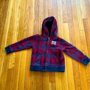 Plaid zip-up hoodie.